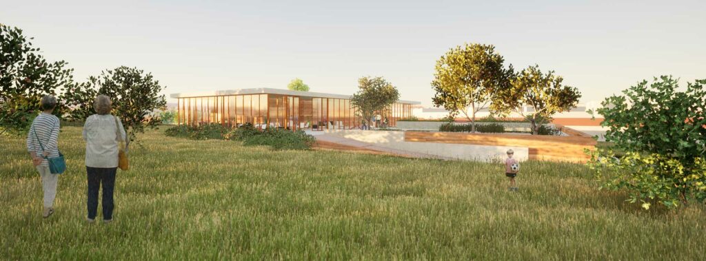 Imagen de un edificio en medio de un prado verde